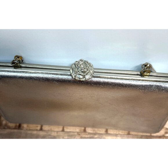 Silver Metallic Clutch Purse With Floral Clasp & Black Interior Lining - Picture 2 of 3